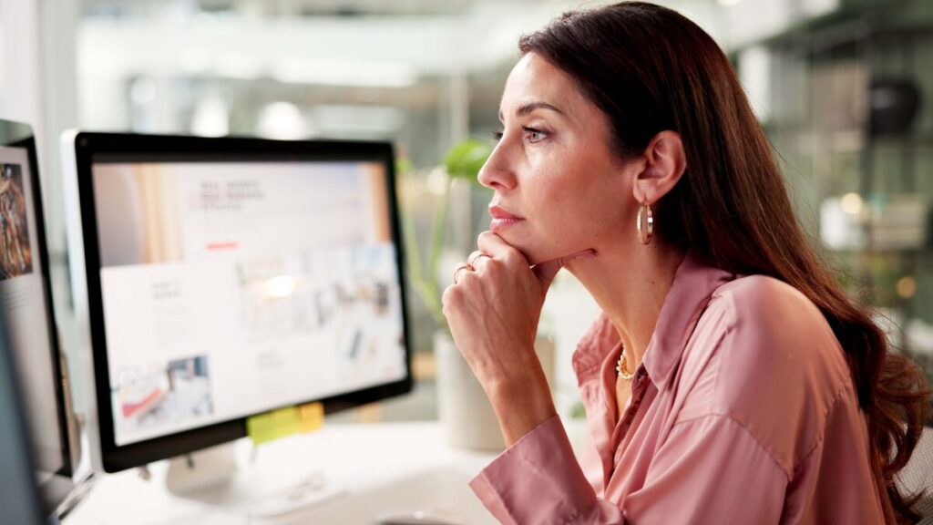 marketer reading about opt-out email campaigns blog