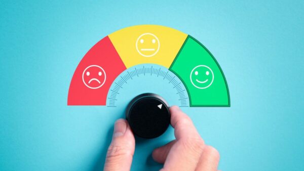 A dial measuring if someone is sad, medium or happy