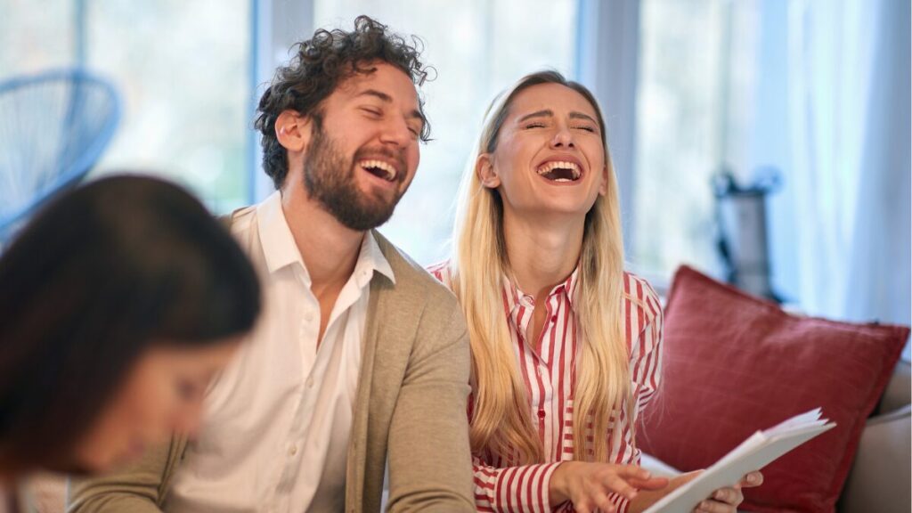 Two marketers laughing