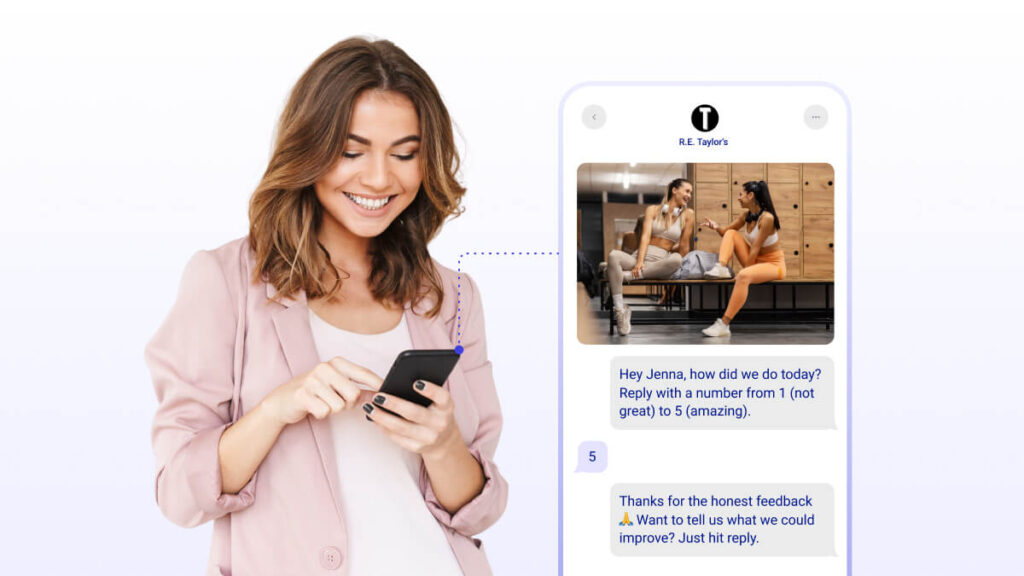Women smiling at phone receiving two-way sms message