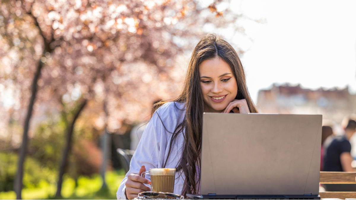 Marketer reading Dotdigital’s social media calendar for May 2024.