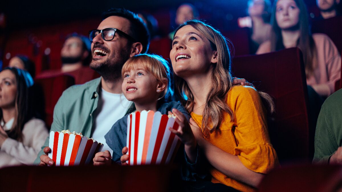 People enjoying entertainment at a theatre.